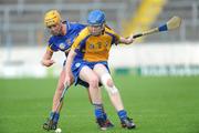 30 June 2012; Maire McGrath, Clare, in action against Alice Fogarty, Tipperary. All-Ireland Senior Camogie Championship Round Two, Tipperary v Clare, Semple Stadium, Thurles, Co. Tipperary. Picture credit: Ray Lohan / SPORTSFILE