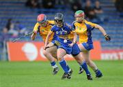 30 June 2012; Jill Horan, Tipperary, in action against Chloe Morey, left, and Kate Lynch, Clare. All-Ireland Senior Camogie Championship Round Two, Tipperary v Clare, Semple Stadium, Thurles, Co. Tipperary. Picture credit: Ray Lohan / SPORTSFILE