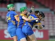 30 June 2012; Marian O'Brien, Clare, in action against Siobhan McGrath and Claire Kennedy, Tipperary. All-Ireland Senior Camogie Championship Round Two, Tipperary v Clare, Semple Stadium, Thurles, Co. Tipperary. Picture credit: Ray Lohan / SPORTSFILE