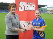 30 June 2012; Tipperary's Mary Ryan is presented with Player of the match award by President of the Camogie Association Aileen Lawlor. All-Ireland Senior Camogie Championship Round Two, Tipperary v Clare, Semple Stadium, Thurles, Co. Tipperary. Picture credit: Ray Lohan / SPORTSFILE