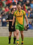 30 June 2012; Referee David Coldrick issues Colm McFadden, Donegal, with a red card late in the game. Ulster GAA Football Senior Championship Semi-Final, Tyrone v Donegal, St Tiernach's Park, Clones, Co. Monaghan. Picture credit: Oliver McVeigh / SPORTSFILE
