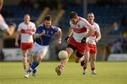 30 June 2012; `Mark Lynch, Derry, in action against Shane Mulligan, Longford. GAA Football All-Ireland Senior Championship Qualifier Round 1, Longford v Derry, Glennon Brothers Pearse Park, Co. Longford. Picture credit: Ray McManus / SPORTSFILE