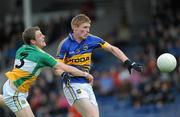 30 June 2012; Richie Ryan, Tipperary, in action against John Moloney, Offaly. GAA Football All-Ireland Senior Championship Qualifier Round 1, Tipperary v Offaly, Semple Stadium, Thurles, Co. Tipperary. Picture credit: Ray Lohan / SPORTSFILE