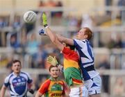 30 June 2012; Pádraig Clancy, Laois, in action against Conor Lawlor, Carlow. GAA Football All-Ireland Senior Championship Qualifier Round 1, Laois v Carlow, O'Moore Park, Portlaoise, Co. Laois. Picture credit: Daire Brennan / SPORTSFILE