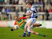 30 June 2012; Tony Bolger, Carlow, in action against Colm Kelly, Laois. GAA Football All-Ireland Senior Championship Qualifier Round 1, Laois v Carlow, O'Moore Park, Portlaoise, Co. Laois. Picture credit: Daire Brennan / SPORTSFILE