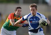 30 June 2012; Ross Munnelly, Laois, in action against Brendan Kavanagh, Carlow. GAA Football All-Ireland Senior Championship Qualifier Round 1, Laois v Carlow, O'Moore Park, Portlaoise, Co. Laois. Picture credit: Daire Brennan / SPORTSFILE