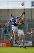 30 June 2012; Brendan Quigley, Laois, in action against Darragh Foley, Carlow. GAA Football All-Ireland Senior Championship Qualifier Round 1, Laois v Carlow, O'Moore Park, Portlaoise, Co. Laois. Picture credit: Daire Brennan / SPORTSFILE