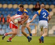 30 June 2012; Sean Leo McGoldrick, Derry, in action against Brendan McElvaney, and Bermor Brady, right, Longford. GAA Football All-Ireland Senior Championship Qualifier Round 1, Longford v Derry, Glennon Brothers Pearse Park, Co. Longford. Picture credit: Ray McManus / SPORTSFILE