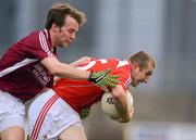 30 June 2012; Ray Finnegan, Louth, in action against Doron Harte, Westmeath. GAA Football All-Ireland Senior Championship Qualifier Round 1, Westmeath v Louth, Cusack Park, Mullingar, Co. Westmeath. Picture credit: David Maher / SPORTSFILE