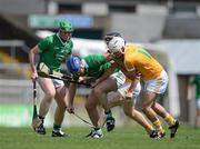 30 June 2012; Brian Geary, Limerick, in action against Neal McAuley, left, and Johnny Campbell, Antrim. GAA Hurling All-Ireland Senior Championship Phase 1, Limerick v Antrim, Gaelic Grounds, Limerick. Picture credit: Dáire Brennan / SPORTSFILE