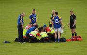 30 June 2012; Longford manager Glenn Ryan and referee Michael Duffy look on as medical personel attend to John Keegan before he was carried off injured early in the second half. GAA Football All-Ireland Senior Championship Qualifier Round 1, Longford v Derry, Glennon Brothers Pearse Park, Co. Longford. Picture credit: Ray McManus / SPORTSFILE