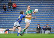 30 June 2012; Nigel Dunne, Offaly, in action against Robbie Kelly, Tipperary. GAA Football All-Ireland Senior Championship Qualifier Round 1, Tipperary v Offaly, Semple Stadium, Thurles, Co. Tipperary. Picture credit: Ray Lohan / SPORTSFILE