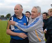30 June 2012; Glenn Ryan, the Longford manager, celebrates victory with selector John Fay. GAA Football All-Ireland Senior Championship Qualifier Round 1, Longford v Derry, Glennon Brothers Pearse Park, Co. Longford. Picture credit: Ray McManus / SPORTSFILE