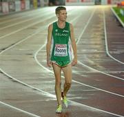 30 June 2012; Ireland's David Rooney after crossing the line in the Men's 10000m Final where he finished in 20th place in a season best time of 29:57.82sec. European Athletics Championship, Day 4, Olympic Stadium, Helsinki, Finland. Picture credit: Brendan Moran / SPORTSFILE