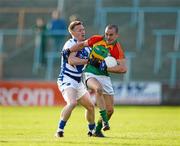 30 June 2012; Tony Bolger, Carlow, in action against Paul Cahillane, Laois. GAA Football All-Ireland Senior Championship Qualifier Round 1, Laois v Carlow, O'Moore Park, Portlaoise, Co. Laois. Picture credit: Daire Brennan / SPORTSFILE