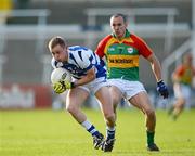 30 June 2012; Damien O'Connor, Laois, in action against Tony Bolger, Carlow. GAA Football All-Ireland Senior Championship Qualifier Round 1, Laois v Carlow, O'Moore Park, Portlaoise, Co. Laois. Picture credit: Daire Brennan / SPORTSFILE