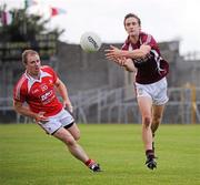 30 June 2012; Kevin Maguire, Westmeath, in action against Aaron Hoey, Louth. GAA Football All-Ireland Senior Championship Qualifier Round 1, Westmeath v Louth, Cusack Park, Mullingar, Co. Westmeath. Picture credit: David Maher / SPORTSFILE
