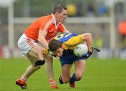 1 July 2012; Colin Compton, Roscommon, in action against Andy Mallon, Armagh. GAA Football All-Ireland Senior Championship Qualifier Round 1, Roscommon v Armagh, Dr. Hyde Park, Co. Roscommon. Picture credit: Barry Cregg / SPORTSFILE