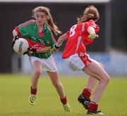 30 June 2012; Saoirse Ludden, Mayo, in action against Ciara Hartnett, Cork. All-Ireland U14 'A' Ladies Football Championship Final 2012, Cork v Mayo, St Brendan’s Park, Birr, Co. Offaly. Picture credit: David Maher / SPORTSFILE
