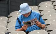 1 July 2012; A Dublin supporter reads his programme before the game. Leinster GAA Football Senior Championship Semi-Final, Dublin v Wexford, Croke Park, Dublin. Picture credit: Ray McManus / SPORTSFILE