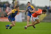 1 July 2012; Jamie Clarke, Armagh, in action against Seánie McDermott, Roscommon. GAA Football All-Ireland Senior Championship Qualifier Round 1, Roscommon v Armagh, Dr. Hyde Park, Co. Roscommon. Picture credit: Barry Cregg / SPORTSFILE