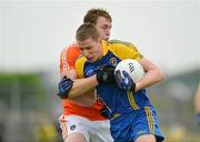 1 July 2012; Michael Finneran, Roscommon, in action against Kieran Toner, Armagh. GAA Football All-Ireland Senior Championship Qualifier Round 1, Roscommon v Armagh, Dr. Hyde Park, Co. Roscommon. Picture credit: Barry Cregg / SPORTSFILE