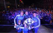 18 September 2017; Paul Flynn, left, Bernard Brogan, centre, and Darren Daly of Dublin, with Ella O'Gara and Jamie Brogan and the Sam Maguire Cup during the All-Ireland Senior Football Champions Homecoming at Smithfield Square in Dublin. Photo by David Fitzgerald/Sportsfile