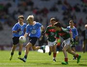 17 September 2017; Cillian Byrne, Poulfur National School, New Ross, Co. Wexford, representing Dublin, in action against Martin Kirk, St. Finloughs PS, Limavady, Co. Derry, representing Mayo, during the INTO Cumann na mBunscol GAA Respect Exhibition Go Games at Dublin v Mayo GAA Football All-Ireland Senior Championship Final at Croke Park in Dublin. Photo by Ray McManus/Sportsfile