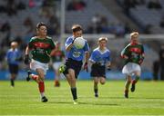17 September 2017; Joshua Butler, St Cronans B. NS in action against Liam O'Connor, C.B.S. Primary School, Dundalk, Co. Louth, representing Mayo, during the INTO Cumann na mBunscol GAA Respect Exhibition Go Games at Dublin v Mayo GAA Football All-Ireland Senior Championship Final at Croke Park in Dublin. Photo by Ray McManus/Sportsfile