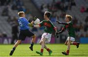 17 September 2017; Roy Murphy, De La Salle NS, Ballyfermot Road, Dublin, representing Dublin, in action against Liam O'Connor, C.B.S. Primary School, Dundalk, Co. Louth, representing Mayo, and Martin Kirk, St. Finloughs PS, Limavady, Co. Derry, representing Mayo, during the INTO Cumann na mBunscol GAA Respect Exhibition Go Games at Dublin v Mayo GAA Football All-Ireland Senior Championship Final at Croke Park in Dublin. Photo by Ray McManus/Sportsfile