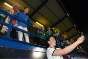 19 September 2017; Megan Campbell of the Republic of Ireland takes a photograph with supporters following the 2019 FIFA Women's World Cup Qualifier Group 3 match between Northern Ireland and Republic of Ireland at Mourneview Park in Lurgan, Co Armagh. Photo by Stephen McCarthy/Sportsfile