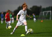 14 September 2017; Allanah Ferrari, age 9, from Irishtown, Dublin, during the Aviva Soccer Sisters Golden Camp. Forty girls from the Aviva ‘Soccer Sisters’ initiative were given the opportunity of a lifetime, as they took part in a special training session alongside several members of the Republic of Ireland women’s senior team. The girls were selected from over 4,000 budding footballers between the ages of seven and 12 to take part in the special session at the FAI National Training Centre, as part of the 2017 Aviva Soccer Sisters Golden Camp. The Camp saw the girls sit in on a full Irish team training session, before taking to the field with the team ahead of next Tuesday’s FIFA World Cup Qualifier against Northern Ireland. The Aviva Soccer Sisters programme has been running since 2010 and is aimed at engaging young girls in physical exercise and attracting them to the game of football. Over 30,000 girls have taken part in the programme since it first kicked off, including Roma McLaughlin who is part of Colin Bell’s line-up for next week’s qualifier.  For further information on Aviva Soccer Sisters, visit: www.aviva.ie/soccersisters  #AvivaSoccerSisters. FAI National Training Centre, Abbotstown, Dublin. Photo by Stephen McCarthy/Sportsfile
