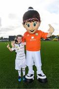 14 September 2017; Sadhbh Simpson, age 9, of Newbridge Town FC, Kildare, with Aviva Soccer Sisters mascot Cara during the Aviva Soccer Sisters Golden Camp. Forty girls from the Aviva ‘Soccer Sisters’ initiative were given the opportunity of a lifetime, as they took part in a special training session alongside several members of the Republic of Ireland women’s senior team. The girls were selected from over 4,000 budding footballers between the ages of seven and 12 to take part in the special session at the FAI National Training Centre, as part of the 2017 Aviva Soccer Sisters Golden Camp. The Camp saw the girls sit in on a full Irish team training session, before taking to the field with the team ahead of next Tuesday’s FIFA World Cup Qualifier against Northern Ireland. The Aviva Soccer Sisters programme has been running since 2010 and is aimed at engaging young girls in physical exercise and attracting them to the game of football. Over 30,000 girls have taken part in the programme since it first kicked off, including Roma McLaughlin who is part of Colin Bell’s line-up for next week’s qualifier.  For further information on Aviva Soccer Sisters, visit: www.aviva.ie/soccersisters  #AvivaSoccerSisters. FAI National Training Centre, Abbotstown, Dublin. Photo by Stephen McCarthy/Sportsfile