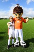14 September 2017; Hope Sherwin, age 12, of St John's AFC, Roscommon, with Aviva Soccer Sisters mascot Cara during the Aviva Soccer Sisters Golden Camp. Forty girls from the Aviva ‘Soccer Sisters’ initiative were given the opportunity of a lifetime, as they took part in a special training session alongside several members of the Republic of Ireland women’s senior team. The girls were selected from over 4,000 budding footballers between the ages of seven and 12 to take part in the special session at the FAI National Training Centre, as part of the 2017 Aviva Soccer Sisters Golden Camp. The Camp saw the girls sit in on a full Irish team training session, before taking to the field with the team ahead of next Tuesday’s FIFA World Cup Qualifier against Northern Ireland. The Aviva Soccer Sisters programme has been running since 2010 and is aimed at engaging young girls in physical exercise and attracting them to the game of football. Over 30,000 girls have taken part in the programme since it first kicked off, including Roma McLaughlin who is part of Colin Bell’s line-up for next week’s qualifier.  For further information on Aviva Soccer Sisters, visit: www.aviva.ie/soccersisters  #AvivaSoccerSisters. FAI National Training Centre, Abbotstown, Dublin. Photo by Stephen McCarthy/Sportsfile