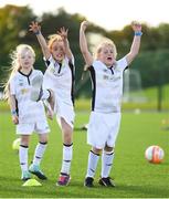 14 September 2017; Attendees Kate Maher, age 8, from Laois, right, Ava Palmer, age 8, of Portmarnock AFC, Dublin, centre, and Shauna McCormack, age 8, of Ballymote Celtic, Sligo, left, react during the Aviva Soccer Sisters Golden Camp. Forty girls from the Aviva ‘Soccer Sisters’ initiative were given the opportunity of a lifetime, as they took part in a special training session alongside several members of the Republic of Ireland women’s senior team. The girls were selected from over 4,000 budding footballers between the ages of seven and 12 to take part in the special session at the FAI National Training Centre, as part of the 2017 Aviva Soccer Sisters Golden Camp. The Camp saw the girls sit in on a full Irish team training session, before taking to the field with the team ahead of next Tuesday’s FIFA World Cup Qualifier against Northern Ireland. The Aviva Soccer Sisters programme has been running since 2010 and is aimed at engaging young girls in physical exercise and attracting them to the game of football. Over 30,000 girls have taken part in the programme since it first kicked off, including Roma McLaughlin who is part of Colin Bell’s line-up for next week’s qualifier.  For further information on Aviva Soccer Sisters, visit: www.aviva.ie/soccersisters  #AvivaSoccerSisters. FAI National Training Centre, Abbotstown, Dublin. Photo by Stephen McCarthy/Sportsfile