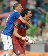 18 June 2012; Italy goalkeeper Gianluigi Buffon and Leonardo Bonucci celebrate after their side qualified for the quarter-finals. EURO2012, Group C, Republic of Ireland v Italy, Municipal Stadium Poznan, Poznan, Poland. Picture credit: Brendan Moran / SPORTSFILE