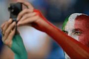 18 June 2012; An Italian supporter takes a photo before the game. EURO2012, Group C, Republic of Ireland v Italy, Municipal Stadium Poznan, Poznan, Poland. Picture credit: Brendan Moran / SPORTSFILE