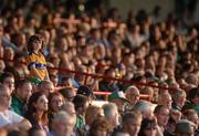 9 June 2012; A young Clare supporter watches on during the game. Munster GAA Football Senior Championship Semi-Final, Limerick v Clare, Gaelic Grounds, Limerick. Picture credit: Diarmuid Greene / SPORTSFILE