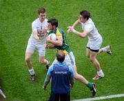 1 July 2012; Brian Meade, Meath, in action against Eoghan O'Flaherty, left, and Emmet Bolton, Kildare, under the eye of Kildare manager Kieran McGeeney. Leinster GAA Football Senior Championship Semi-Final, Meath v Kildare, Croke Park, Dublin. Picture credit: Daire Brennan / SPORTSFILE