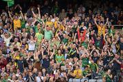 1 July 2012; Supporters, in the Hogan Stand, cheer a 68th minute point for Meath. Leinster GAA Football Senior Championship Semi-Final, Meath v Kildare, Croke Park, Dublin. Picture credit: Ray McManus / SPORTSFILE
