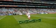 1 July 2012; The Kildare captain John Doyle takes his seat on the bench for the traditional team photograph. Leinster GAA Football Senior Championship Semi-Final, Meath v Kildare, Croke Park, Dublin. Picture credit: Ray McManus / SPORTSFILE