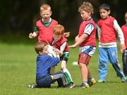 4 July 2012; Eli Greene, right, tries to retrive the ball from Gavin McNichol, left, as they work on their skills while enjoying the first bit of sun this summer at the Old Belvedere RFC VW Leinster Rugby Camp. Anglesea Road, Donnybrook, Dublin. Picture credit: Barry Cregg / SPORTSFILE