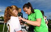 14 September 2017; Aoine O'Gorman of the Republic of Ireland women's national team signs an autograph for Katie Rigley, age 9, from  Irishtown, Dublin, during the Aviva Soccer Sisters Golden Camp. Forty girls from the Aviva ‘Soccer Sisters’ initiative were given the opportunity of a lifetime, as they took part in a special training session alongside several members of the Republic of Ireland women’s senior team. The girls were selected from over 4,000 budding footballers between the ages of seven and 12 to take part in the special session at the FAI National Training Centre, as part of the 2017 Aviva Soccer Sisters Golden Camp. The Camp saw the girls sit in on a full Irish team training session, before taking to the field with the team ahead of next Tuesday’s FIFA World Cup Qualifier against Northern Ireland. The Aviva Soccer Sisters programme has been running since 2010 and is aimed at engaging young girls in physical exercise and attracting them to the game of football. Over 30,000 girls have taken part in the programme since it first kicked off, including Roma McLaughlin who is part of Colin Bell’s line-up for next week’s qualifier.  For further information on Aviva Soccer Sisters, visit: www.aviva.ie/soccersisters  #AvivaSoccerSisters. FAI National Training Centre, Abbotstown, Dublin. Photo by Stephen McCarthy/Sportsfile