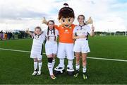 14 September 2017; Attendees, from Tipperary, with Aviva Soccer Sisters mascot Cara, from left, Lauren Corcoran, age 9, of Killenaule Moyglass Ladies, Katie O'Connor, age 11, of Cahir Park AFC, and Louise McGrath, age 12, of Ballymackey Football Club, during the Aviva Soccer Sisters Golden Camp. Forty girls from the Aviva ‘Soccer Sisters’ initiative were given the opportunity of a lifetime, as they took part in a special training session alongside several members of the Republic of Ireland women’s senior team. The girls were selected from over 4,000 budding footballers between the ages of seven and 12 to take part in the special session at the FAI National Training Centre, as part of the 2017 Aviva Soccer Sisters Golden Camp. The Camp saw the girls sit in on a full Irish team training session, before taking to the field with the team ahead of next Tuesday’s FIFA World Cup Qualifier against Northern Ireland. The Aviva Soccer Sisters programme has been running since 2010 and is aimed at engaging young girls in physical exercise and attracting them to the game of football. Over 30,000 girls have taken part in the programme since it first kicked off, including Roma McLaughlin who is part of Colin Bell’s line-up for next week’s qualifier.  For further information on Aviva Soccer Sisters, visit: www.aviva.ie/soccersisters  #AvivaSoccerSisters. FAI National Training Centre, Abbotstown, Dublin. Photo by Stephen McCarthy/Sportsfile