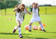14 September 2017; Ava Palmer, age 8, of Portmarnock AFC, Dublin, reacts during the Aviva Soccer Sisters Golden Camp. Forty girls from the Aviva ‘Soccer Sisters’ initiative were given the opportunity of a lifetime, as they took part in a special training session alongside several members of the Republic of Ireland women’s senior team. The girls were selected from over 4,000 budding footballers between the ages of seven and 12 to take part in the special session at the FAI National Training Centre, as part of the 2017 Aviva Soccer Sisters Golden Camp. The Camp saw the girls sit in on a full Irish team training session, before taking to the field with the team ahead of next Tuesday’s FIFA World Cup Qualifier against Northern Ireland. The Aviva Soccer Sisters programme has been running since 2010 and is aimed at engaging young girls in physical exercise and attracting them to the game of football. Over 30,000 girls have taken part in the programme since it first kicked off, including Roma McLaughlin who is part of Colin Bell’s line-up for next week’s qualifier.  For further information on Aviva Soccer Sisters, visit: www.aviva.ie/soccersisters  #AvivaSoccerSisters. FAI National Training Centre, Abbotstown, Dublin. Photo by Stephen McCarthy/Sportsfile