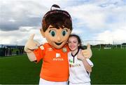 14 September 2017; Eabha Dolan, age 11, of Killorglin, Kerry, with Aviva Soccer Sisters mascot Cara during the Aviva Soccer Sisters Golden Camp. Forty girls from the Aviva ‘Soccer Sisters’ initiative were given the opportunity of a lifetime, as they took part in a special training session alongside several members of the Republic of Ireland women’s senior team. The girls were selected from over 4,000 budding footballers between the ages of seven and 12 to take part in the special session at the FAI National Training Centre, as part of the 2017 Aviva Soccer Sisters Golden Camp. The Camp saw the girls sit in on a full Irish team training session, before taking to the field with the team ahead of next Tuesday’s FIFA World Cup Qualifier against Northern Ireland. The Aviva Soccer Sisters programme has been running since 2010 and is aimed at engaging young girls in physical exercise and attracting them to the game of football. Over 30,000 girls have taken part in the programme since it first kicked off, including Roma McLaughlin who is part of Colin Bell’s line-up for next week’s qualifier.  For further information on Aviva Soccer Sisters, visit: www.aviva.ie/soccersisters  #AvivaSoccerSisters. FAI National Training Centre, Abbotstown, Dublin. Photo by Stephen McCarthy/Sportsfile