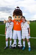 14 September 2017; Katie Law, age 12, left, and Chloe Carroll, age 12, with Aviva Soccer Sisters mascot Cara during the Aviva Soccer Sisters Golden Camp. Forty girls from the Aviva ‘Soccer Sisters’ initiative were given the opportunity of a lifetime, as they took part in a special training session alongside several members of the Republic of Ireland women’s senior team. The girls were selected from over 4,000 budding footballers between the ages of seven and 12 to take part in the special session at the FAI National Training Centre, as part of the 2017 Aviva Soccer Sisters Golden Camp. The Camp saw the girls sit in on a full Irish team training session, before taking to the field with the team ahead of next Tuesday’s FIFA World Cup Qualifier against Northern Ireland. The Aviva Soccer Sisters programme has been running since 2010 and is aimed at engaging young girls in physical exercise and attracting them to the game of football. Over 30,000 girls have taken part in the programme since it first kicked off, including Roma McLaughlin who is part of Colin Bell’s line-up for next week’s qualifier.  For further information on Aviva Soccer Sisters, visit: www.aviva.ie/soccersisters  #AvivaSoccerSisters. FAI National Training Centre, Abbotstown, Dublin. Photo by Stephen McCarthy/Sportsfile