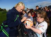14 September 2017; Stephanie Roche of the Republic of Ireland women's national team signs an autogrpah for Lauren Corcoran, age 9, of Killenaule Moyglass Ladies, Tipperary,  during the Aviva Soccer Sisters Golden Camp. Forty girls from the Aviva ‘Soccer Sisters’ initiative were given the opportunity of a lifetime, as they took part in a special training session alongside several members of the Republic of Ireland women’s senior team. The girls were selected from over 4,000 budding footballers between the ages of seven and 12 to take part in the special session at the FAI National Training Centre, as part of the 2017 Aviva Soccer Sisters Golden Camp. The Camp saw the girls sit in on a full Irish team training session, before taking to the field with the team ahead of next Tuesday’s FIFA World Cup Qualifier against Northern Ireland. The Aviva Soccer Sisters programme has been running since 2010 and is aimed at engaging young girls in physical exercise and attracting them to the game of football. Over 30,000 girls have taken part in the programme since it first kicked off, including Roma McLaughlin who is part of Colin Bell’s line-up for next week’s qualifier.  For further information on Aviva Soccer Sisters, visit: www.aviva.ie/soccersisters  #AvivaSoccerSisters. FAI National Training Centre, Abbotstown, Dublin. Photo by Stephen McCarthy/Sportsfile