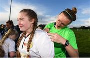 14 September 2017; Louise Quinn of the Republic of Ireland women's national team signs an autograph during the Aviva Soccer Sisters Golden Camp. Forty girls from the Aviva ‘Soccer Sisters’ initiative were given the opportunity of a lifetime, as they took part in a special training session alongside several members of the Republic of Ireland women’s senior team. The girls were selected from over 4,000 budding footballers between the ages of seven and 12 to take part in the special session at the FAI National Training Centre, as part of the 2017 Aviva Soccer Sisters Golden Camp. The Camp saw the girls sit in on a full Irish team training session, before taking to the field with the team ahead of next Tuesday’s FIFA World Cup Qualifier against Northern Ireland. The Aviva Soccer Sisters programme has been running since 2010 and is aimed at engaging young girls in physical exercise and attracting them to the game of football. Over 30,000 girls have taken part in the programme since it first kicked off, including Roma McLaughlin who is part of Colin Bell’s line-up for next week’s qualifier.  For further information on Aviva Soccer Sisters, visit: www.aviva.ie/soccersisters  #AvivaSoccerSisters. FAI National Training Centre, Abbotstown, Dublin. Photo by Stephen McCarthy/Sportsfile