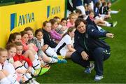 14 September 2017; FAI coach Sharon Boyle with attendees during the Aviva Soccer Sisters Golden Camp. Forty girls from the Aviva ‘Soccer Sisters’ initiative were given the opportunity of a lifetime, as they took part in a special training session alongside several members of the Republic of Ireland women’s senior team. The girls were selected from over 4,000 budding footballers between the ages of seven and 12 to take part in the special session at the FAI National Training Centre, as part of the 2017 Aviva Soccer Sisters Golden Camp. The Camp saw the girls sit in on a full Irish team training session, before taking to the field with the team ahead of next Tuesday’s FIFA World Cup Qualifier against Northern Ireland. The Aviva Soccer Sisters programme has been running since 2010 and is aimed at engaging young girls in physical exercise and attracting them to the game of football. Over 30,000 girls have taken part in the programme since it first kicked off, including Roma McLaughlin who is part of Colin Bell’s line-up for next week’s qualifier.  For further information on Aviva Soccer Sisters, visit: www.aviva.ie/soccersisters  #AvivaSoccerSisters. FAI National Training Centre, Abbotstown, Dublin. Photo by Stephen McCarthy/Sportsfile